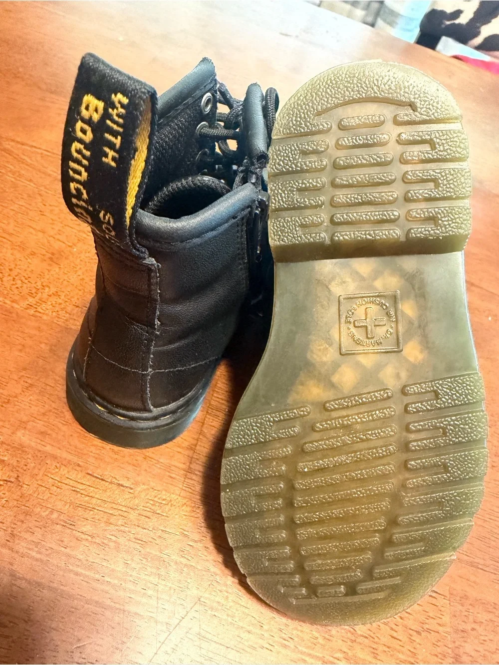 Dr. Martens Black Lace-Up Combat Boots with Yellow Welt Stitching